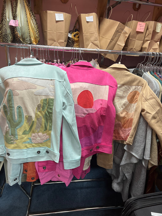 WAY jackets with scenes on back