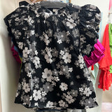 Entro black shirt white flowers