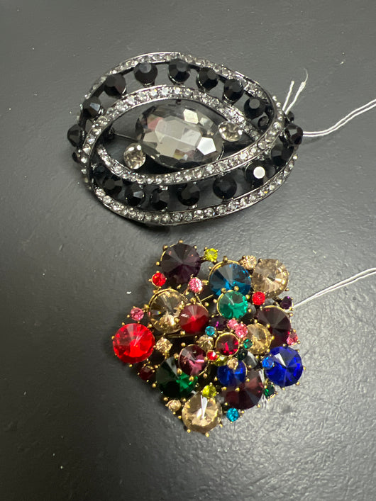 Lordane brooches