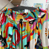 Boho chic multi bright abstract smocked neck dress